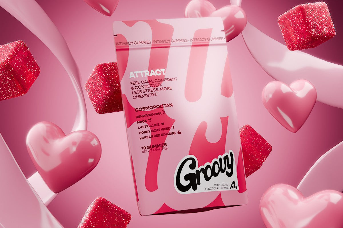 Groovy Attract Cosmopolitan gummies surrounded by red gummies and pink hearts