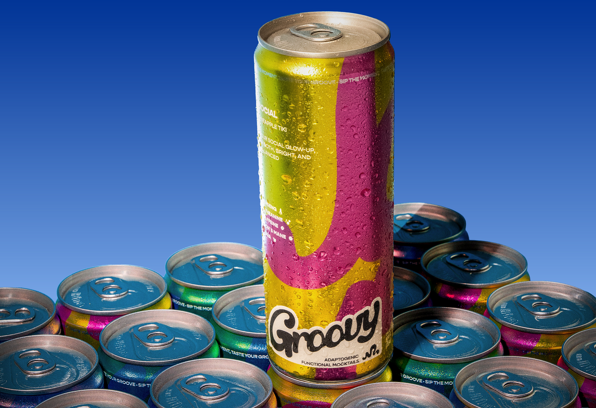 A Groovy Social can against a deep blue sky