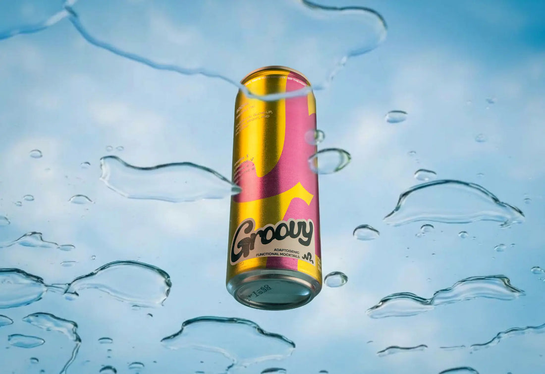 Groovy Social can floating in water against a bright blue sky